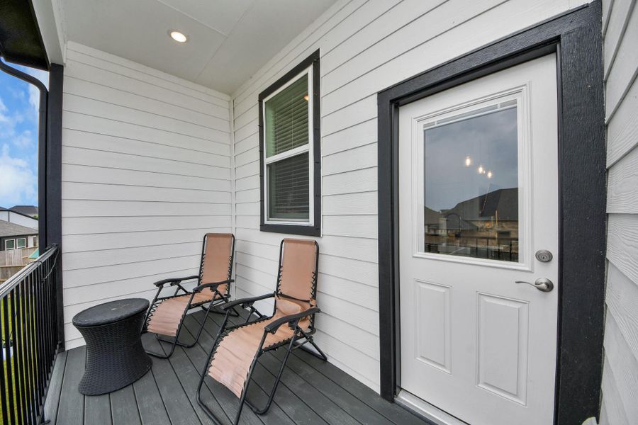 Exterior details and patio area of a home in Meridiana Courtyard Collection, Manvel (Image 28).