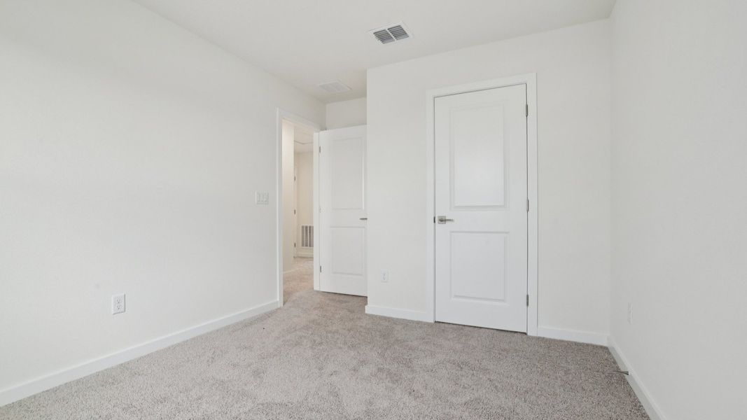 Secondary Bed of the Coronado - End at Cyrene at Harmony located in St Cloud FL by DRB Homes Secondary Bed of the Coronado - End at Cyrene at Harmony located in St Cloud FL by DRB Homes