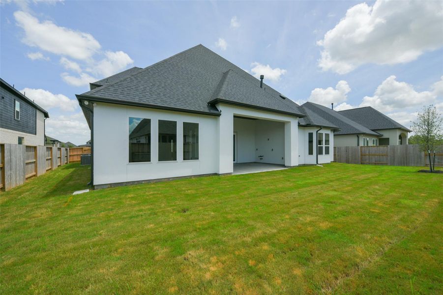 Front exterior of a new home in , Manvel, TX, highlighting curb appeal (Image 23). Front exterior of a new home in , Manvel, TX, highlighting curb appeal (Image 23).