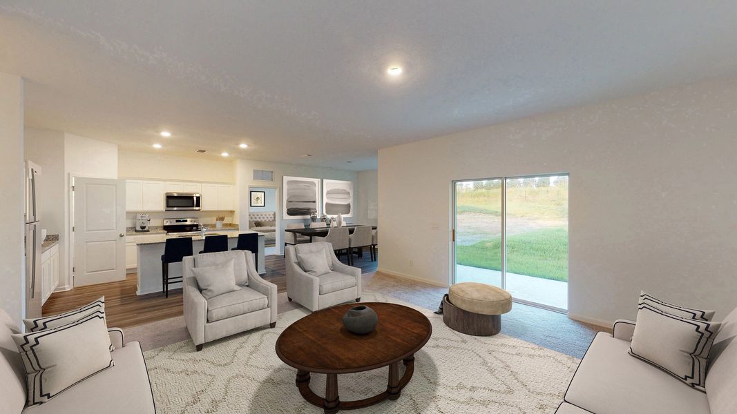 Representative furnished interior of a home built from the Orion by Starlight Homes in Vista Walk, Dade City (Image 5).