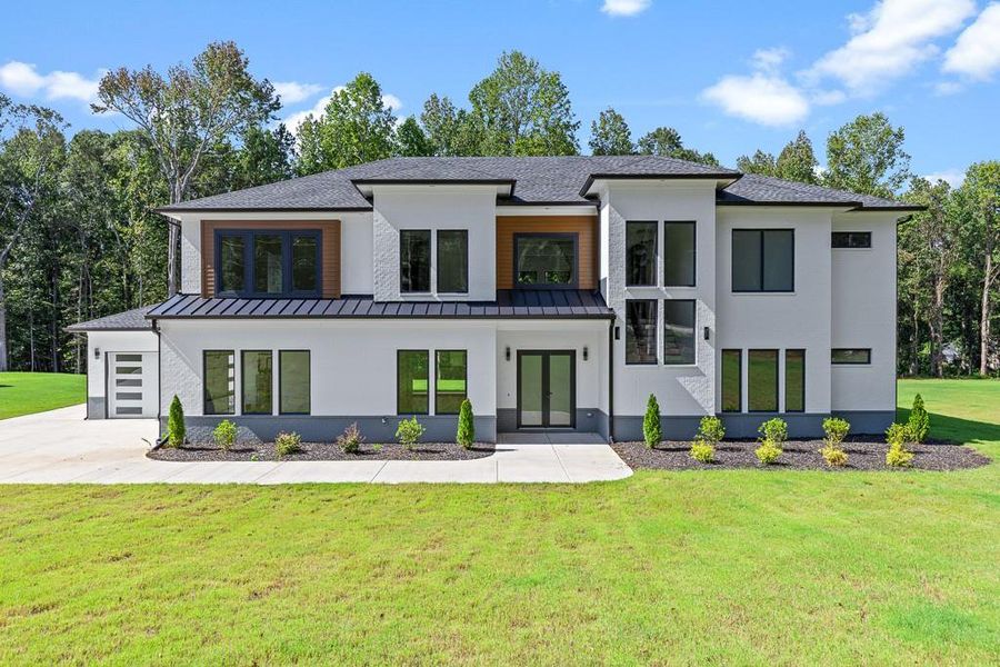 Front exterior of a new home in , Jefferson, GA, highlighting curb appeal (Image 24).