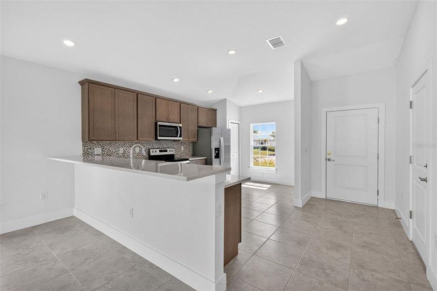 Furnished interior view inside a new home in , Port Charlotte (Image 6). Furnished interior view inside a new home in , Port Charlotte (Image 6).