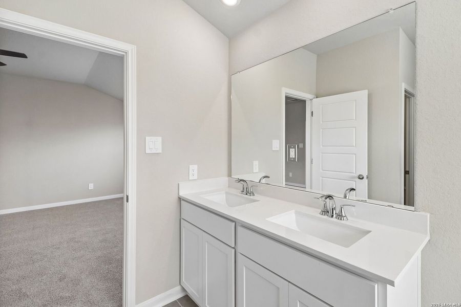 Furnished interior view inside a new home in Estancia Ranch - Premier Series, San Antonio (Image 17).