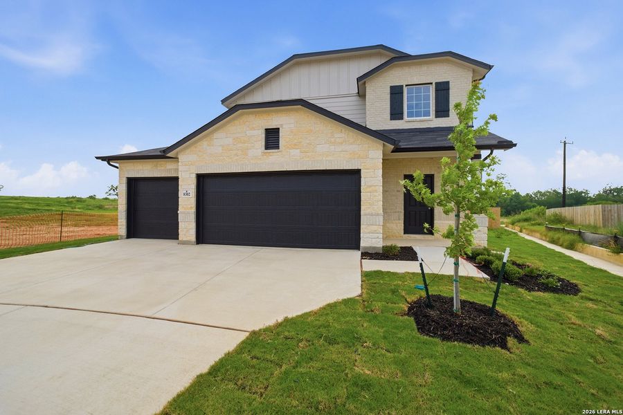 Front exterior of a new home in Garden Grove, San Antonio, TX, highlighting curb appeal (Image 22).