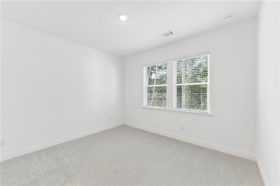 Spacious, unfurnished interior of a new home in Bailey Fence, Dacula (Image 20).