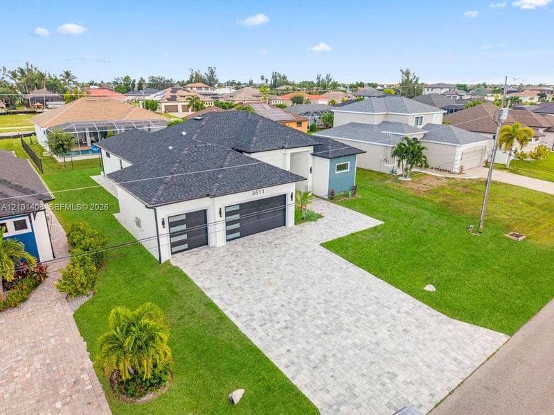 Front exterior of a new home in , Cape Coral, FL, highlighting curb appeal (Image 30).
