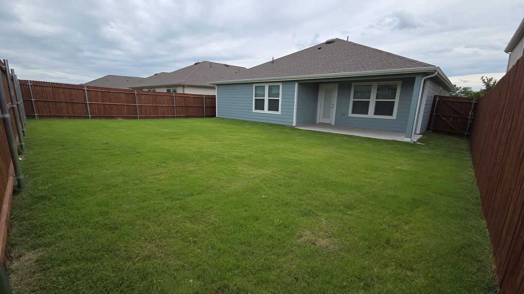 Exterior details and patio area of a home in Wildwood, Royse City (Image 17).