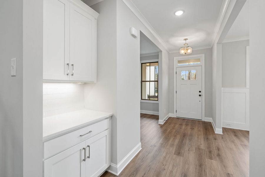 Cabinet space featured in the foyer