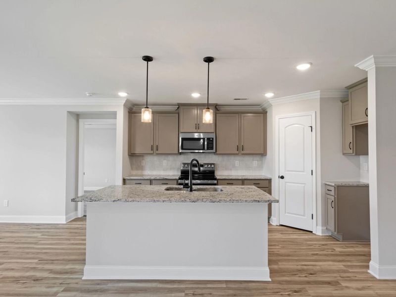 Representative furnished interior of a home built from the The Holly C by Davidson Homes LLC in Heartland, Heartland (Image 6). Representative furnished interior of a home built from the The Holly C by Davidson Homes LLC in Heartland, Heartland (Image 6).