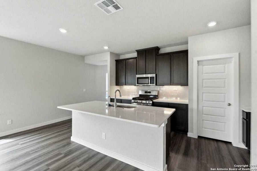 Furnished interior view inside a new home in August Fields, New Braunfels (Image 5).