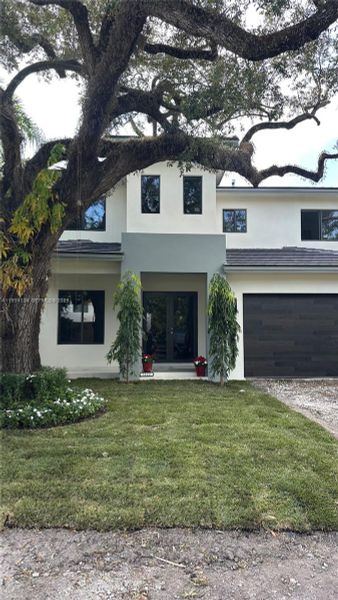 Front exterior of a new home in , Miami, FL, highlighting curb appeal (Image 1). Front exterior of a new home in , Miami, FL, highlighting curb appeal (Image 1).