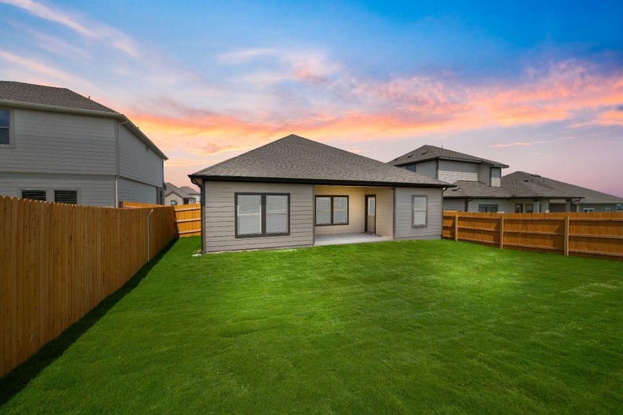 Rear of Home and Private Backyard