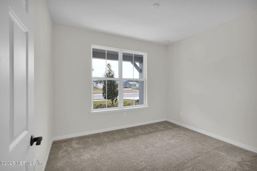 Spacious, unfurnished interior of a new home in Del Webb Wildlight, Yulee (Image 22).