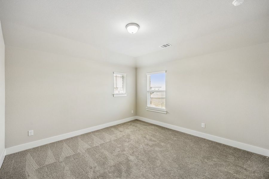 Representative unfurnished interior of a home built from the The Mockingbird by Lillian Custom Homes in Polo Ridge, Forney (Image 46).