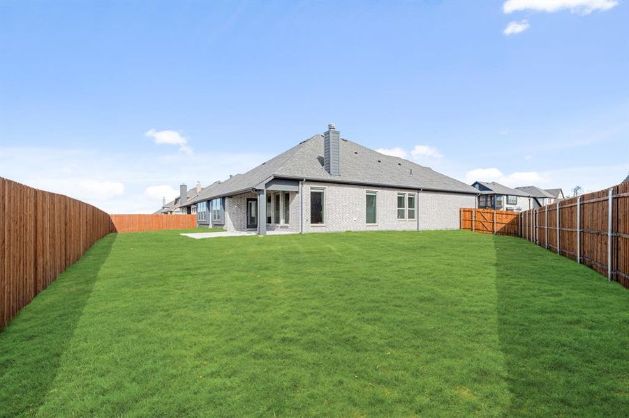Exterior details and patio area of a home in Villages of Walnut Grove, Midlothian (Image 24).