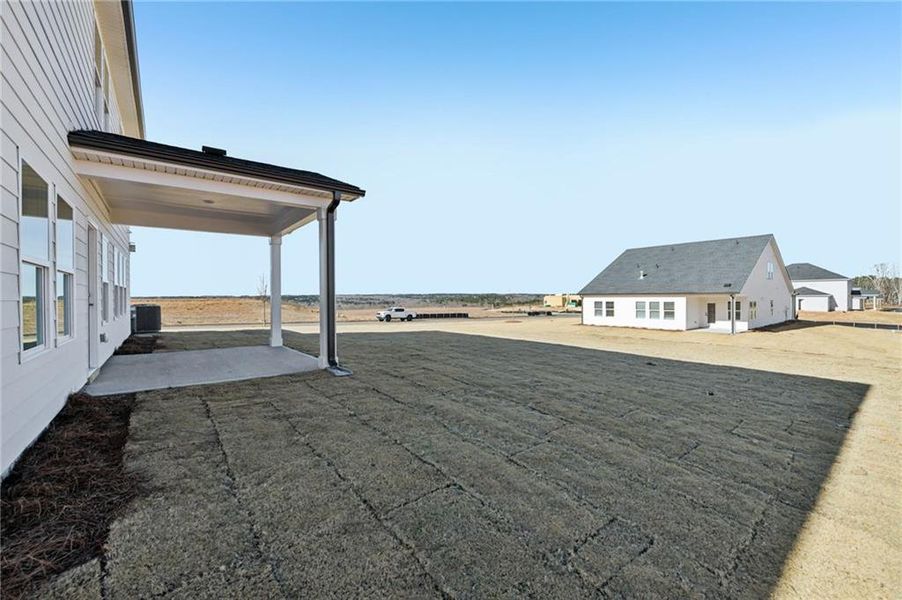 Exterior details and patio area of a home in River Pointe, Monroe (Image 30).