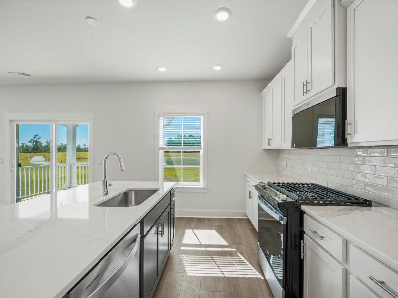 Furnished interior view inside a new home in The Coves at Lakes of Cane Bay II, Summerville (Image 7).