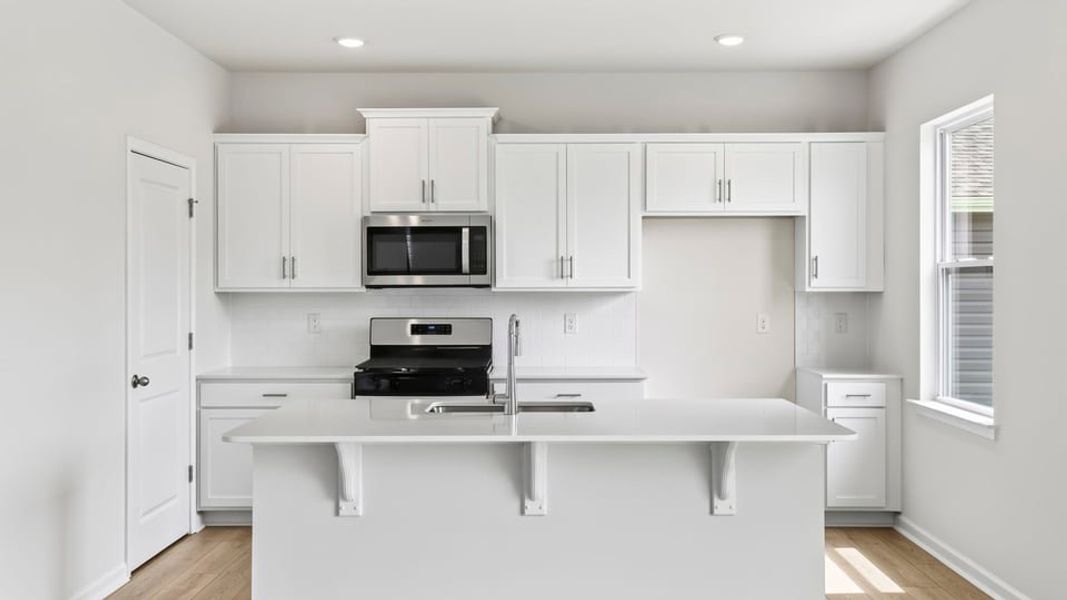 Furnished interior view inside a new home in Durbin Meadows Traditions, Fountain Inn (Image 8).