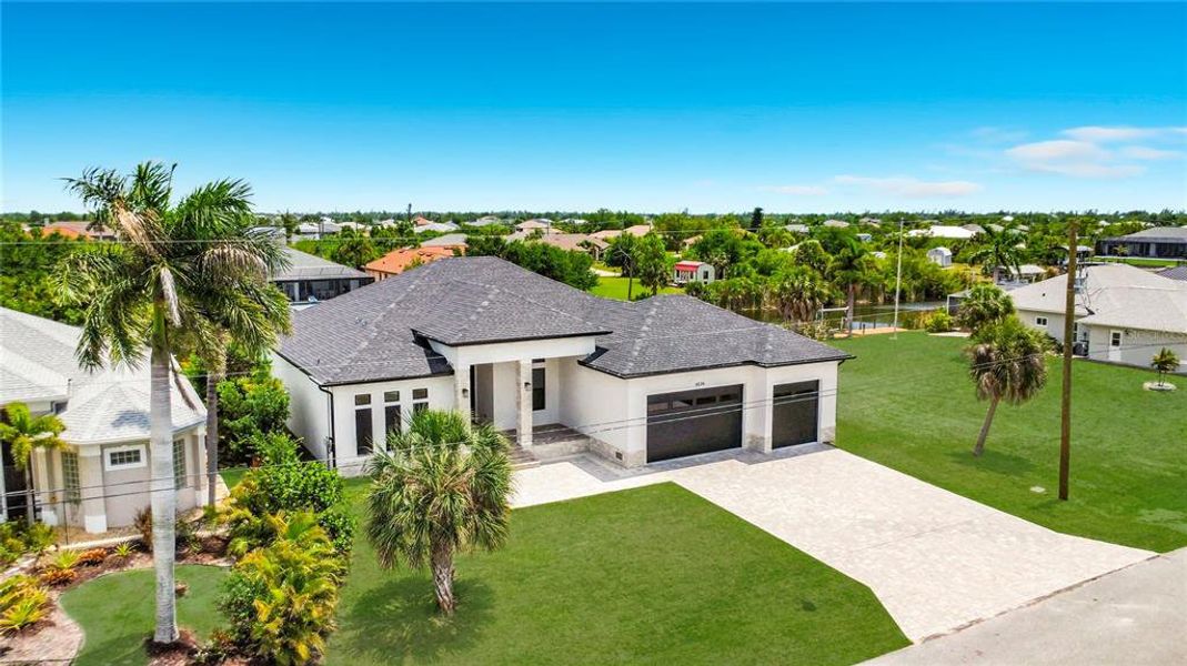Front exterior of a new home in , Port Charlotte, FL, highlighting curb appeal (Image 21).