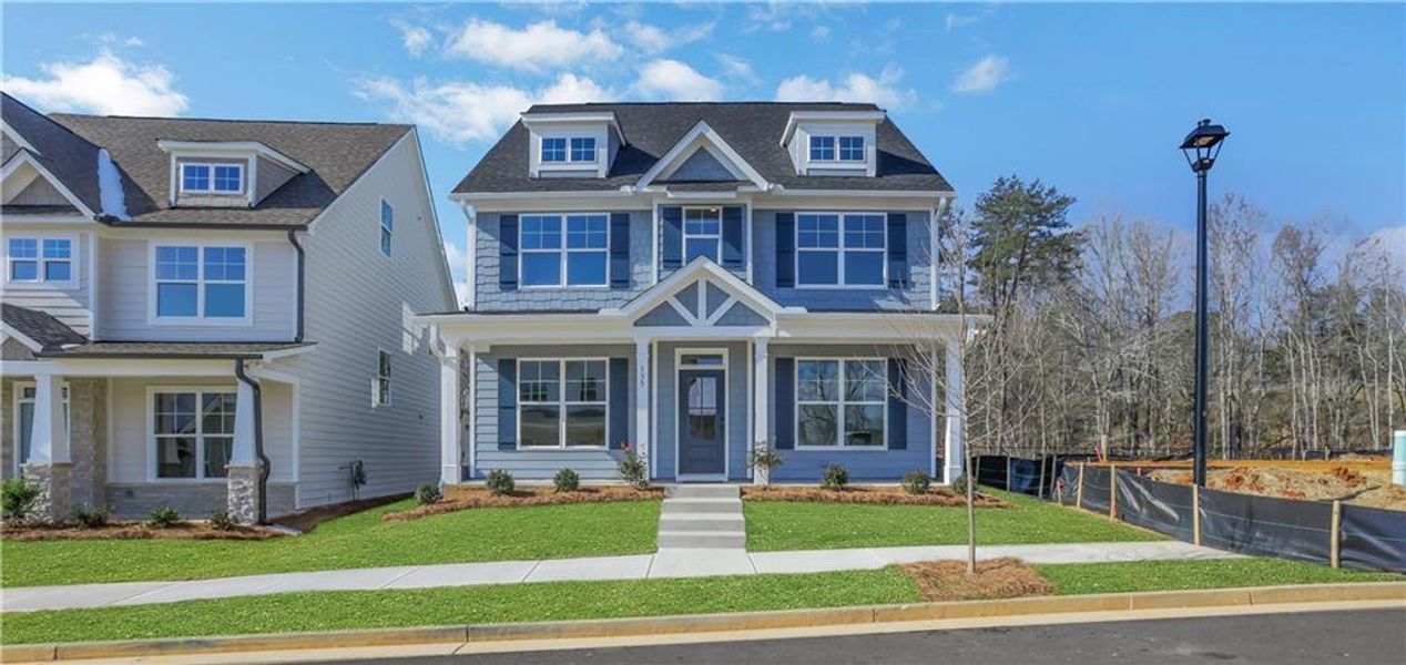 Front exterior of a new home in Marble Tree, Ball Ground, GA, highlighting curb appeal (Image 23).