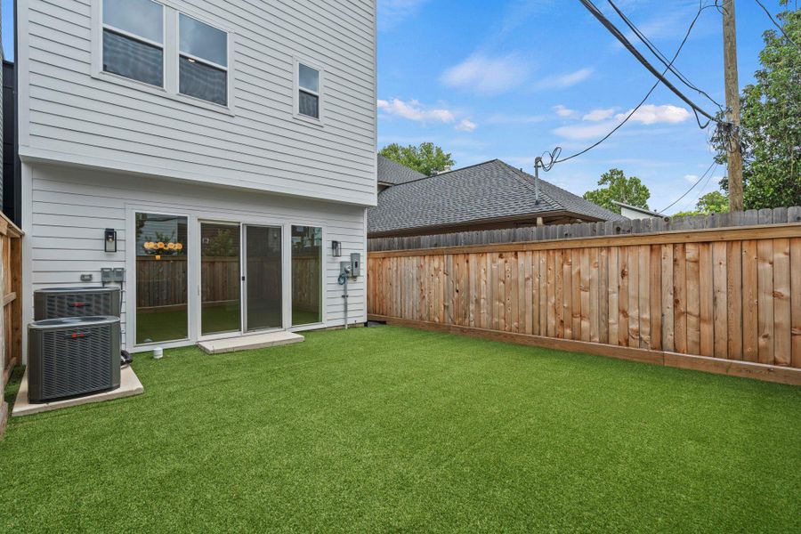Exterior details and patio area of a home in , Houston (Image 3).