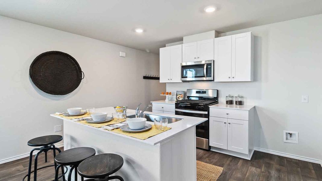 Representative furnished interior of a home built from the Barton by D.R. Horton in Watermark, Alvin (Image 6).