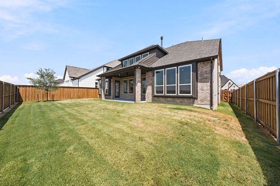 Exterior details and patio area of a home in Furst Ranch, Argyle (Image 4).