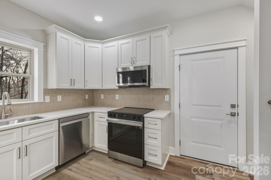 Furnished interior view inside a new home in , Concord (Image 5).