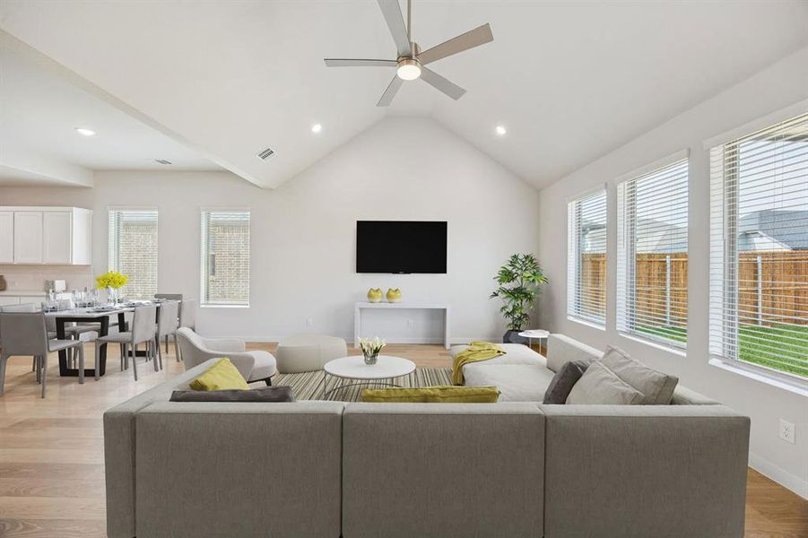 Living and Dining Room in the Stanley II home plan by Trophy Signature Homes – REPRESENTATIVE PHO