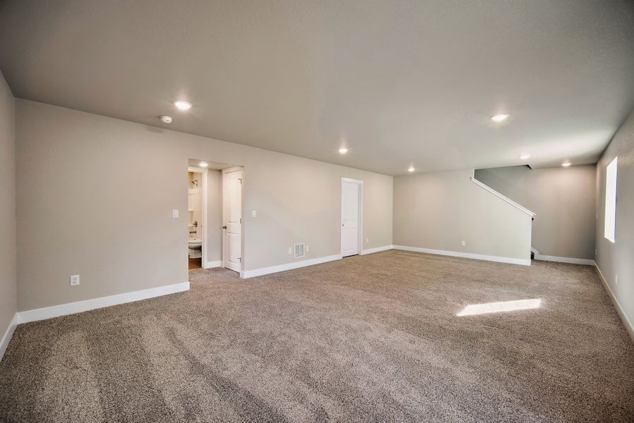 Spacious, unfurnished interior of a new home in Ridge at Lorson Ranch, Colorado Springs (Image 38).