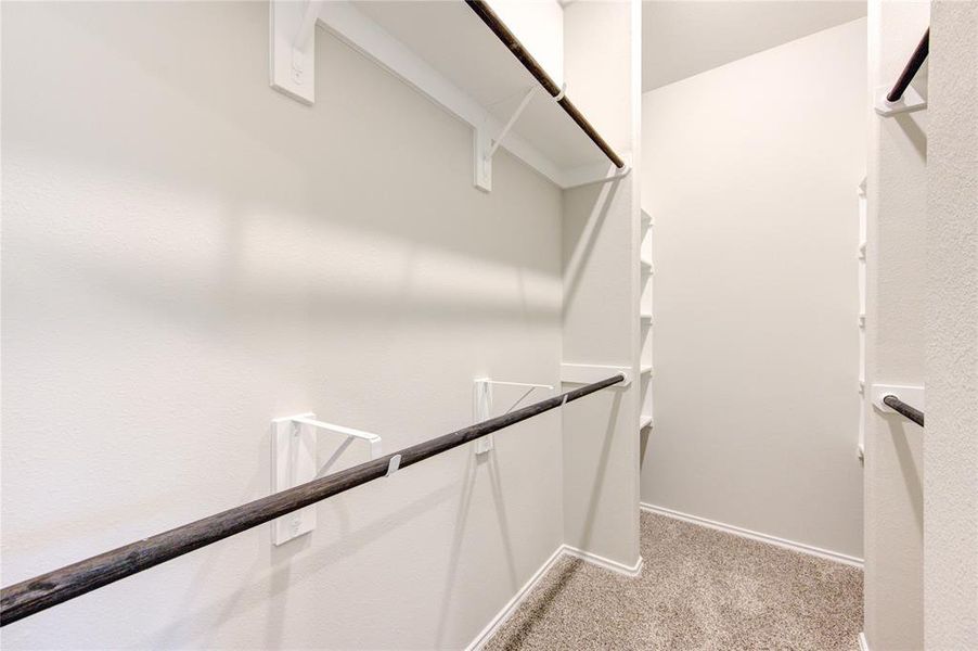 The endless master walk in closets this highly reputable builder is famous for features 3 wardrobe racks!