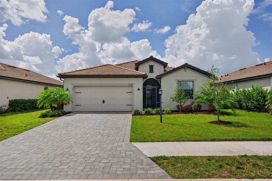 Front exterior of a new home in , Bradenton, FL, highlighting curb appeal (Image 2). Front exterior of a new home in , Bradenton, FL, highlighting curb appeal (Image 2).