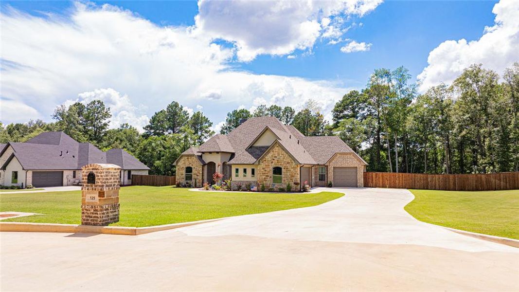 Front exterior of a new home in , Longview, TX, highlighting curb appeal (Image 1). Front exterior of a new home in , Longview, TX, highlighting curb appeal (Image 1).