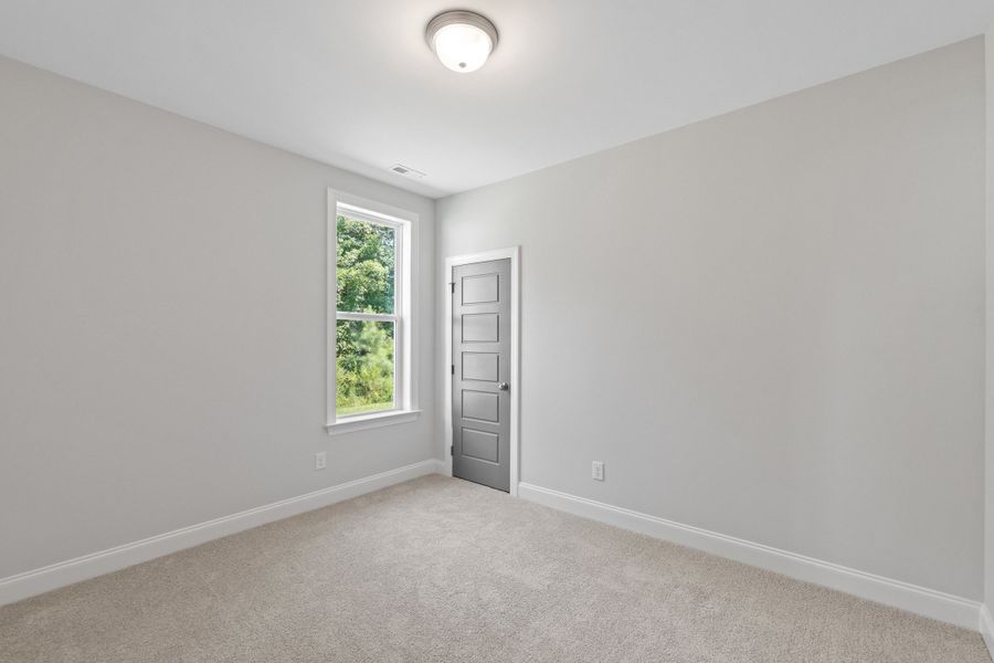 Representative unfurnished interior of a home built from the The Ellery by RobuckHomes in Baylee Ridge, Selma (Image 94).
