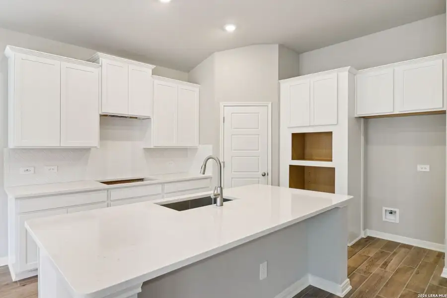 Furnished interior view inside a new home in Estancia Ranch - Classic Series, San Antonio (Image 5).