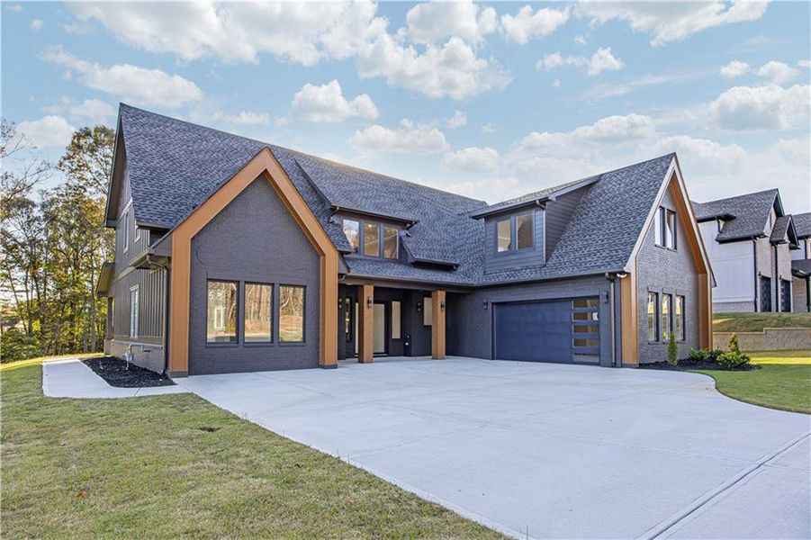 Front exterior of a new home in , Auburn, GA, highlighting curb appeal (Image 25).