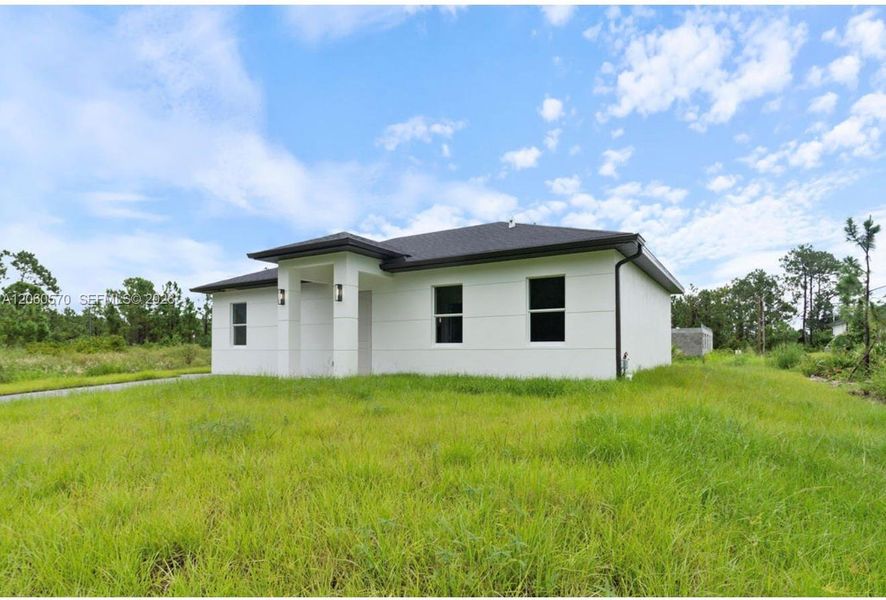 Exterior details and patio area of a home in , Lehigh Acres (Image 26).