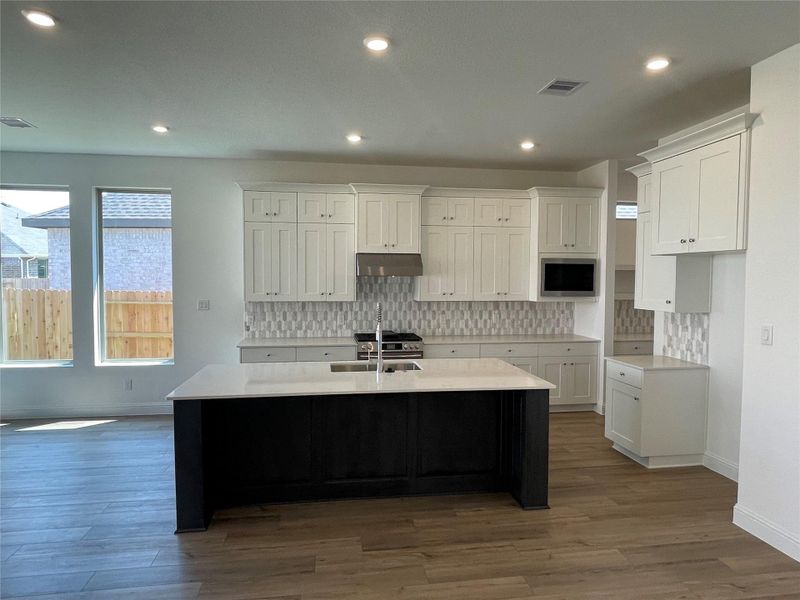 **Photos are a representation of the floor plan. This is not the actual homesite.**