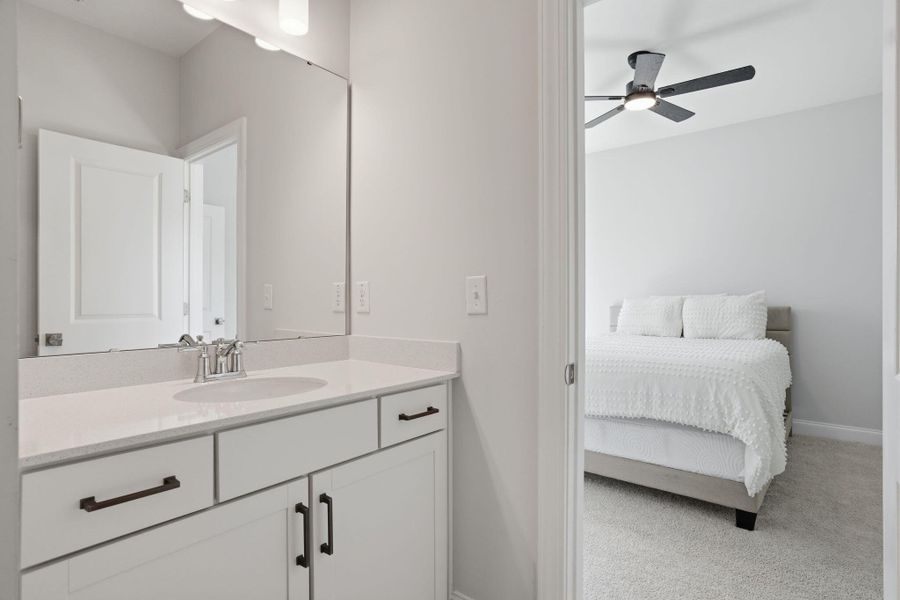 Furnished interior view inside a new home in Tidewater at Lakes of Cane Bay, Summerville (Image 41).
