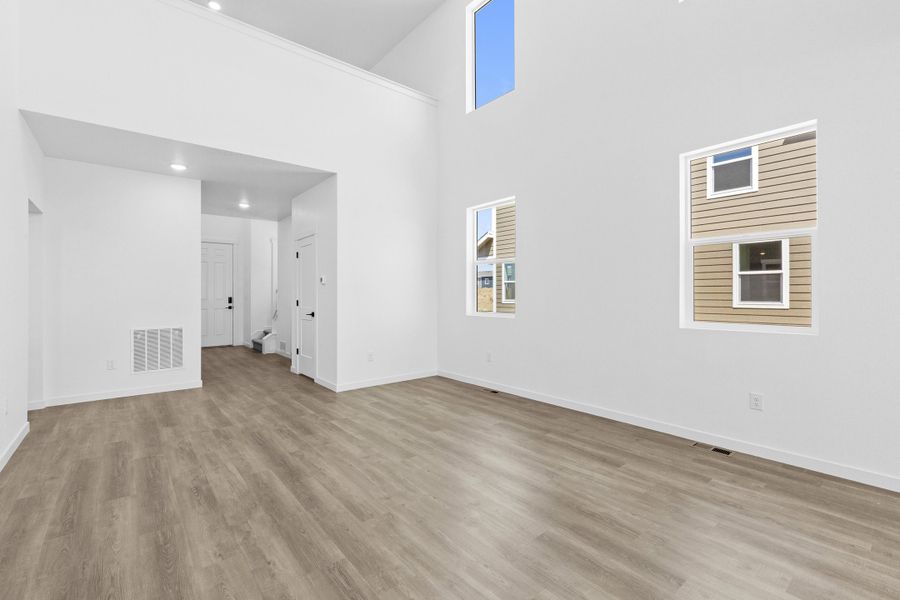 Representative unfurnished interior of a home built from the Bloom Series - Sunflower by Brightland Homes in Granary, Johnstown (Image 13). Representative unfurnished interior of a home built from the Bloom Series - Sunflower by Brightland Homes in Granary, Johnstown (Image 13).