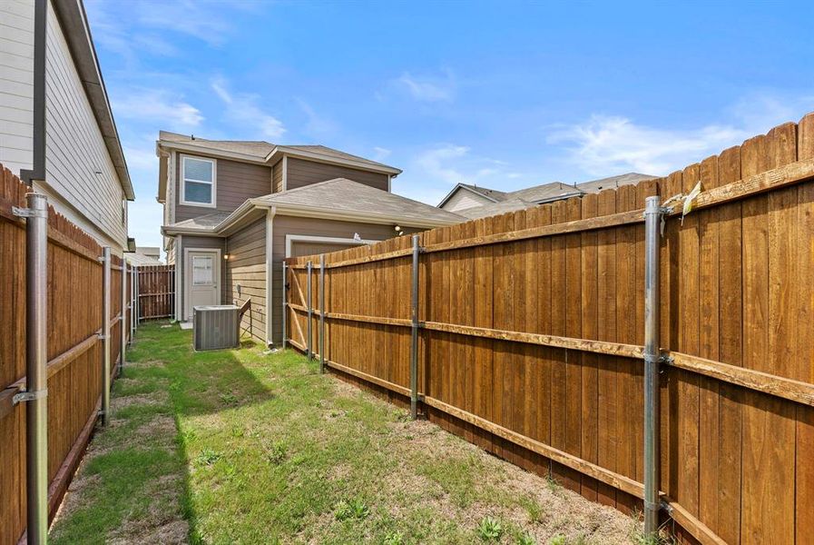 Exterior details and patio area of a home in Orchard Village, Fort Worth (Image 4). Exterior details and patio area of a home in Orchard Village, Fort Worth (Image 4).
