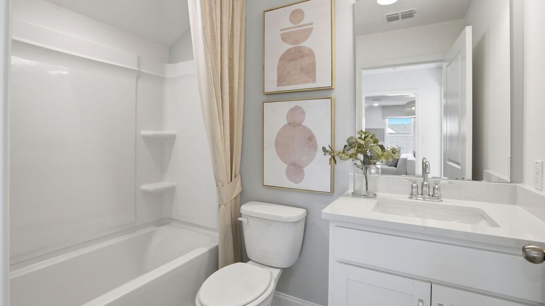 Representative furnished interior of a home built from the Compass by Del Webb in Del Webb Point Hope, Charleston (Image 20).