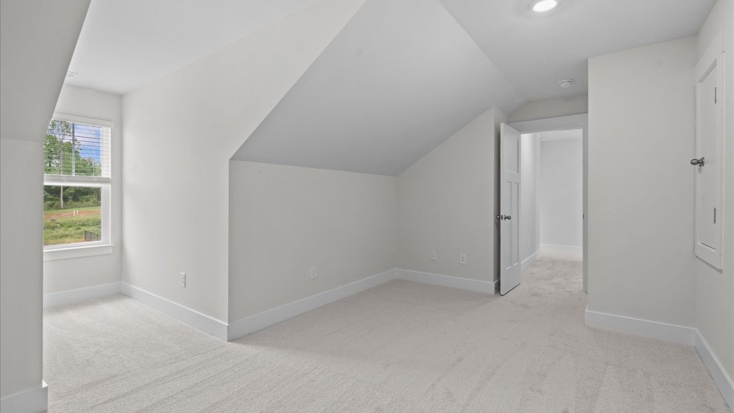 Carpeted loft in two story townhome at Aspen Ridge by DRB Homes in Lyman, SC Carpeted loft in two story townhome at Aspen Ridge by DRB Homes in Lyman, SC