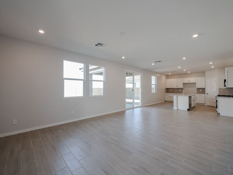 A large empty room with white walls.