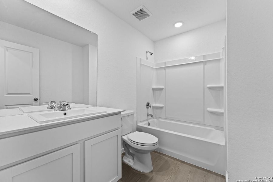 Furnished interior view inside a new home in Torian Village: Watermill Collection, San Antonio (Image 5).