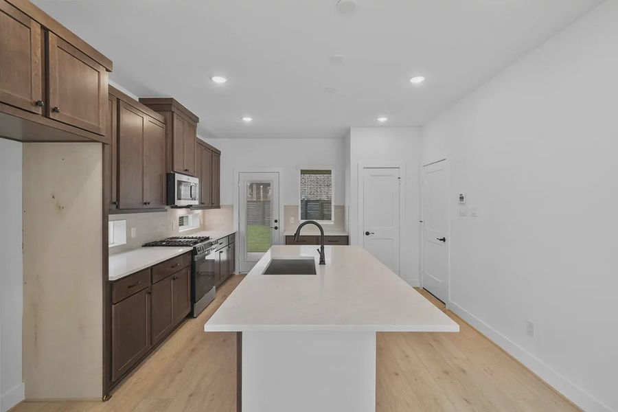 Furnished interior view inside a new home in Bridgeland Courtyard, Cypress (Image 5).