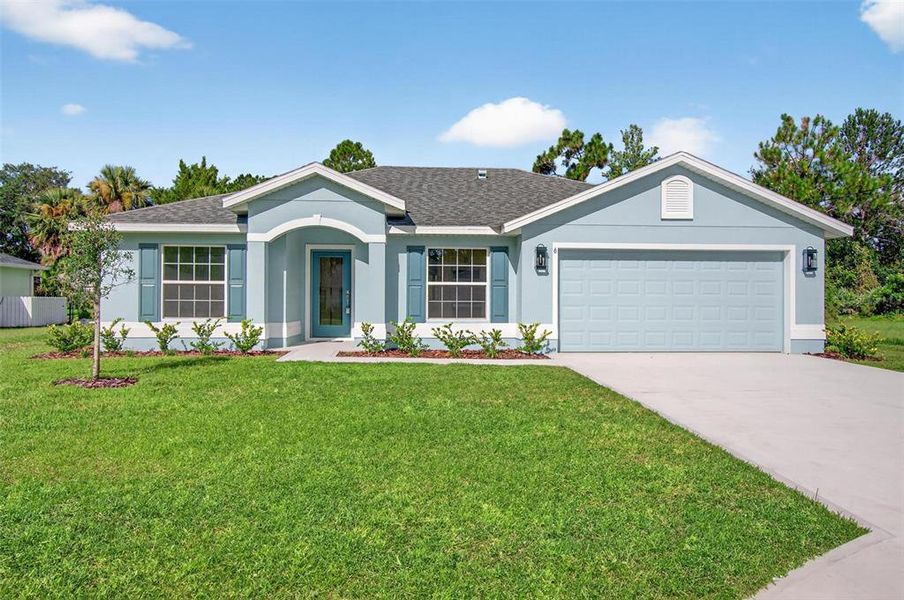 Front exterior of a new home in , Palm Coast, FL, highlighting curb appeal (Image 25).