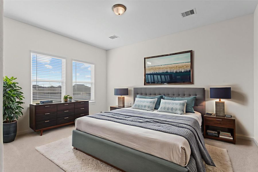 Virtually Staged – Upstairs private guest bedroom with large windows, neutral tones, and tucked away!