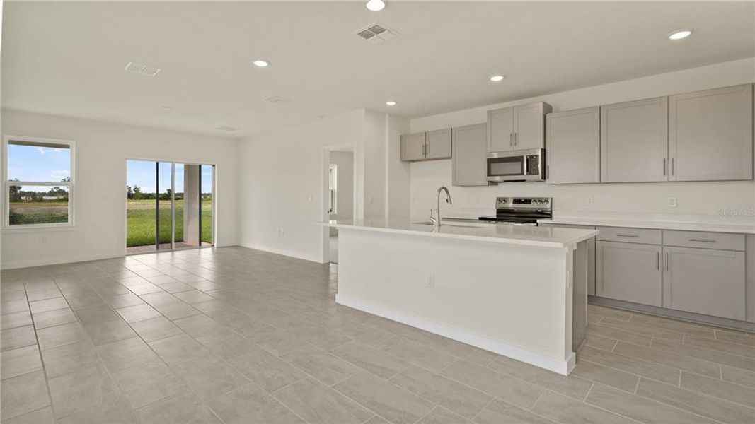Furnished interior view inside a new home in Willowbrook North, Winter Haven (Image 4).