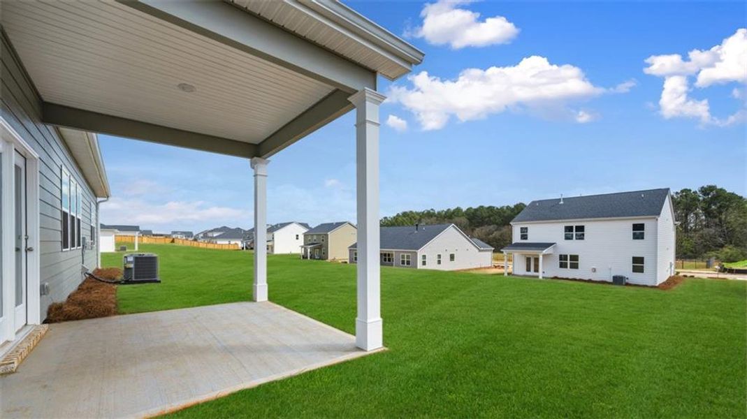 Exterior details and patio area of a home in Preserve at Dove Creek, Statham (Image 4). Exterior details and patio area of a home in Preserve at Dove Creek, Statham (Image 4).
